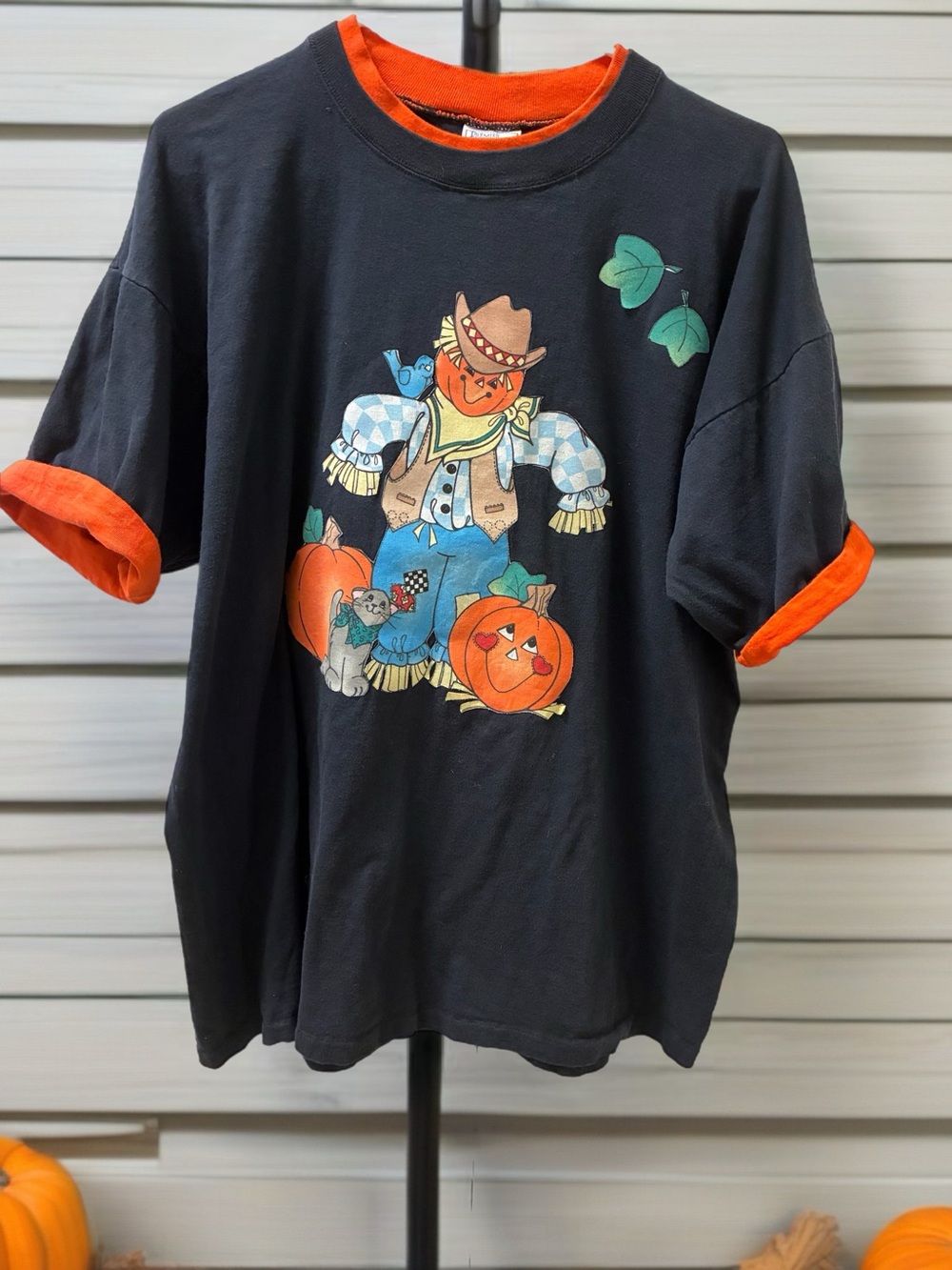 Vintage Black Halloween Scarecrow Pumpkin Graphic Tee with Orange Accents